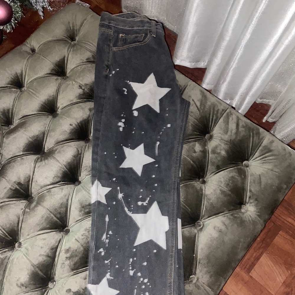 star jeans from MNMl the jeans are grey with silver stars . Size 30 waist